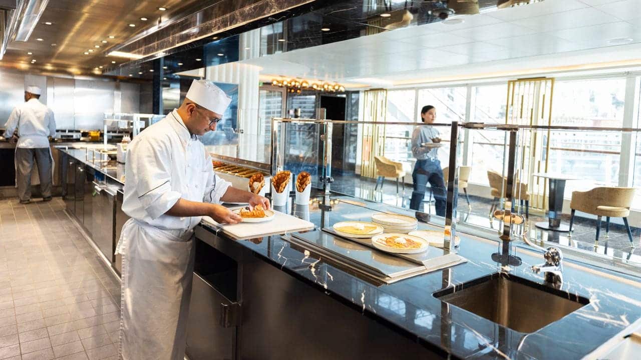 Chef preparing crepes at Allura’s creperie