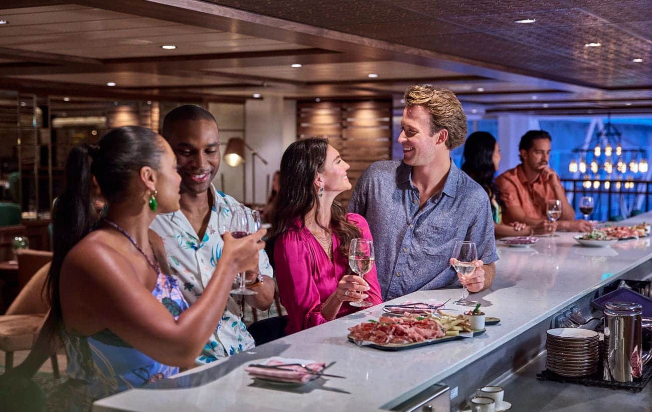 Guests at Giovanni’s Wine Bar on Utopia of the Seas