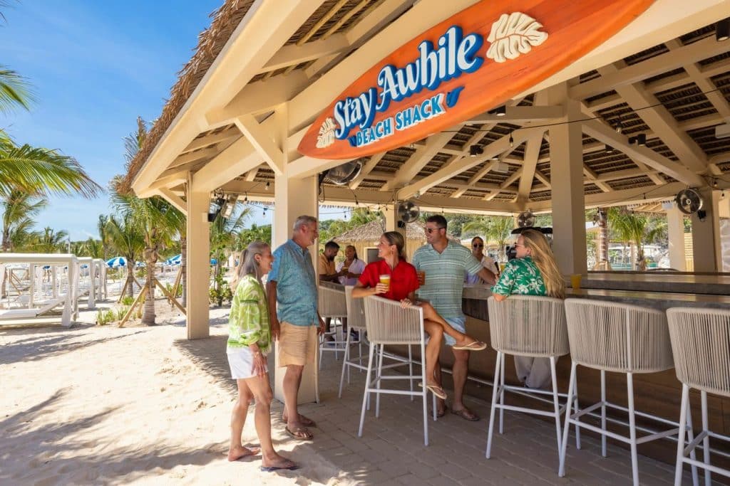 Stay Awhile Beach Shack with guests at bar