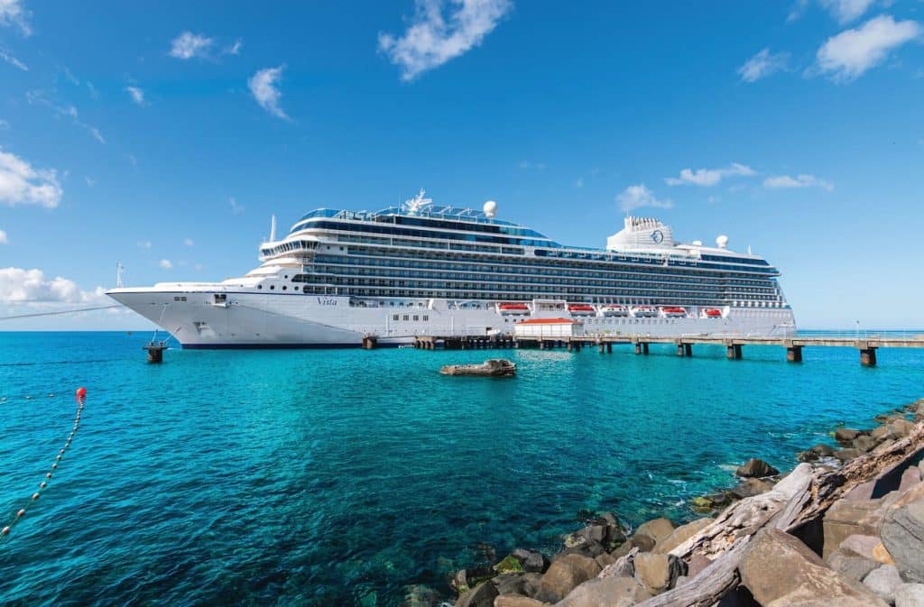 Oceania Vista docked in Roseau, Dominica during 2026 Caribbean Sailings