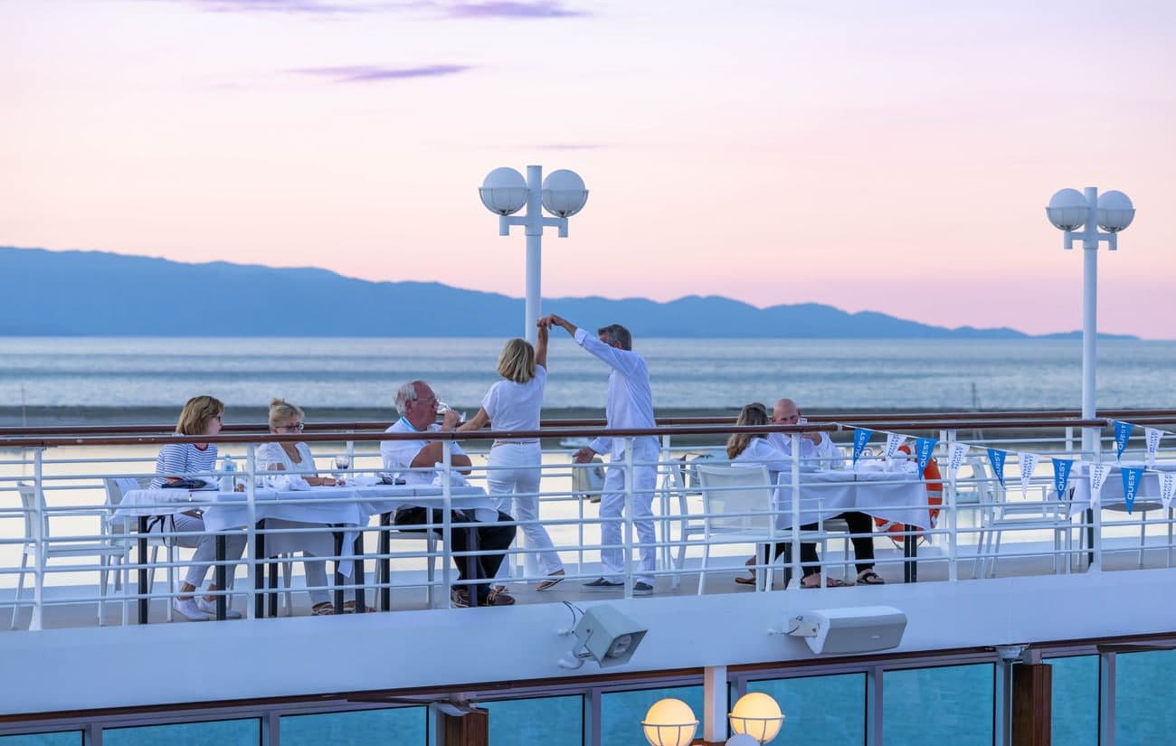 Guests dancing during White Night on deck