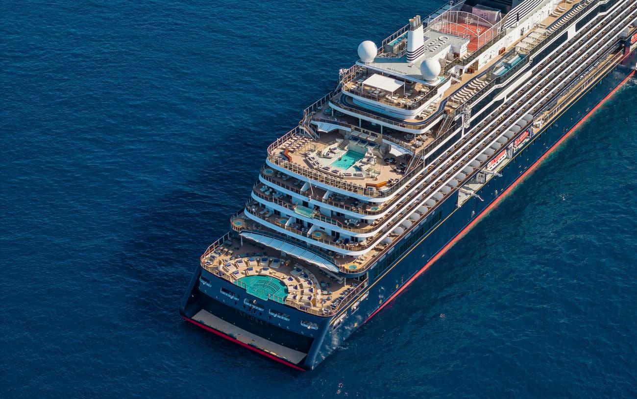 Aerial view of EXPLORA II showing tiered aft decks and swimming pools