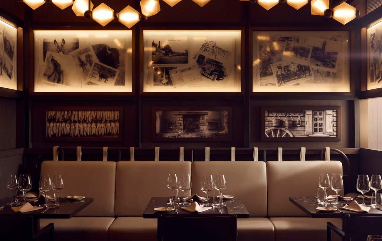 Marble and Co. Grill dining room with illuminated artwork