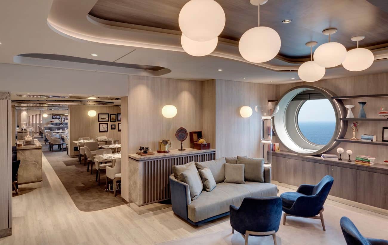 Med Yacht Club lounge and dining area with ocean view