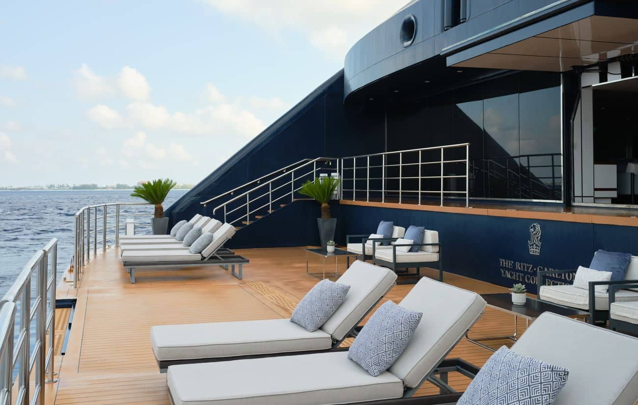 Marina terrace with loungers and waterside seating