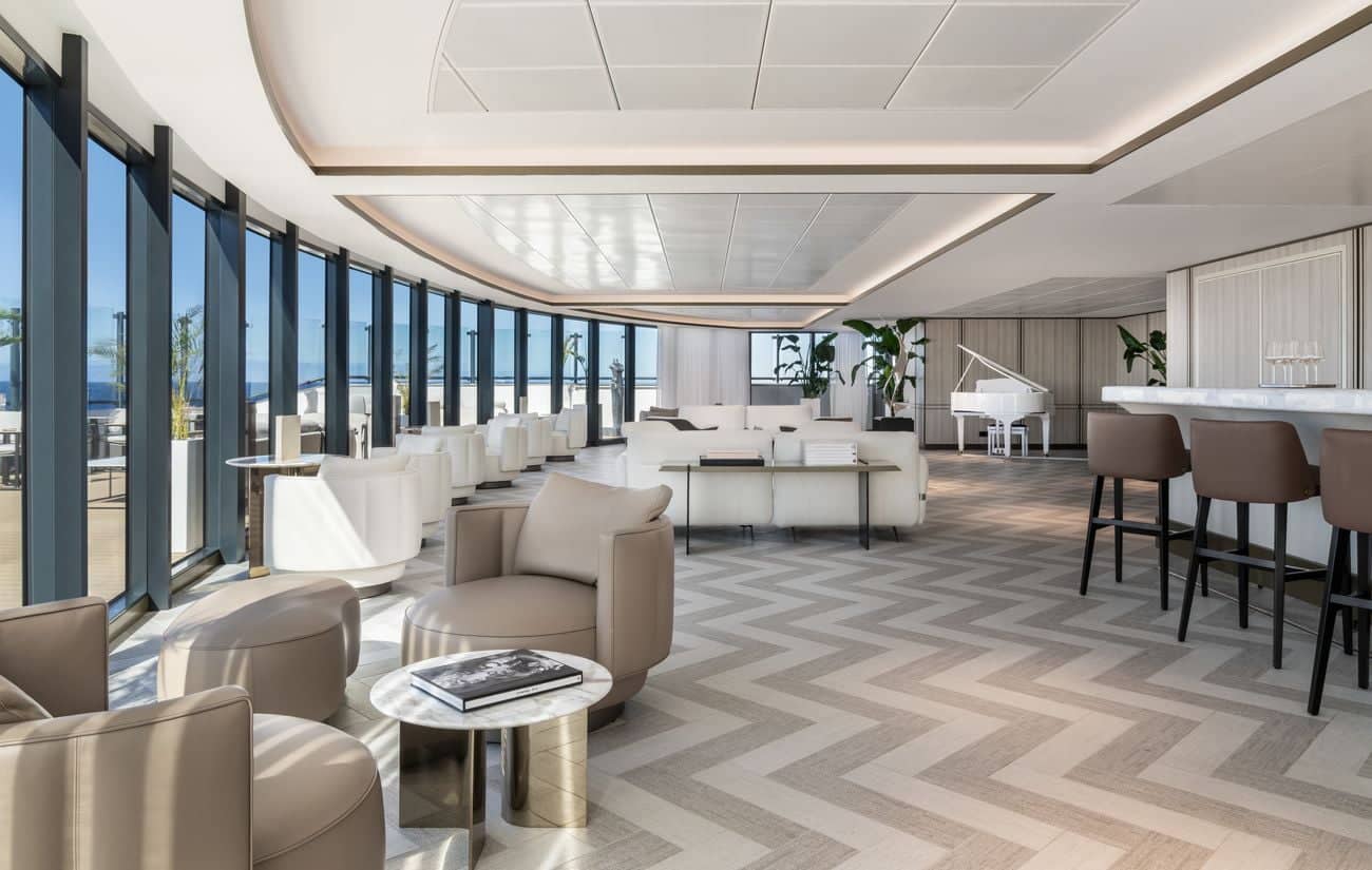 Art Bar lounge with floor-to-ceiling windows and white seating