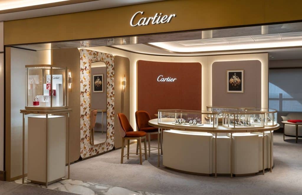 Cartier boutique aboard Luminara with illuminated jewelry and watch displays