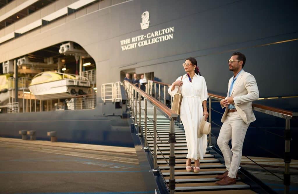 Guests boarding Luminara at the start of their yacht cruise experience