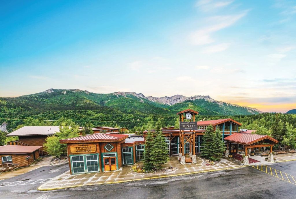 Holland America Denali Lodge beneath Alaska mountain scenery
